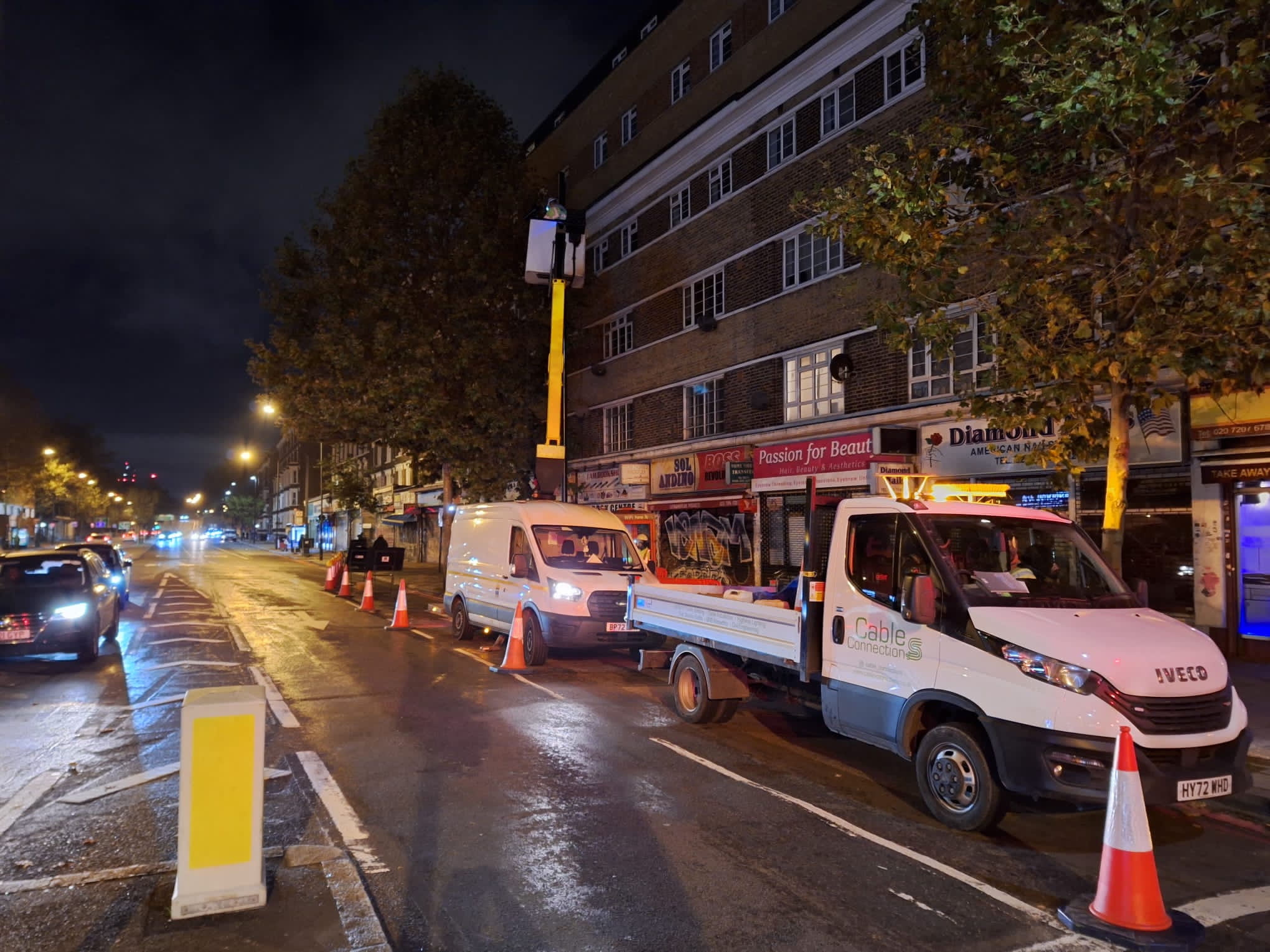 Vans parked on Old Kent Road upgrading lighting